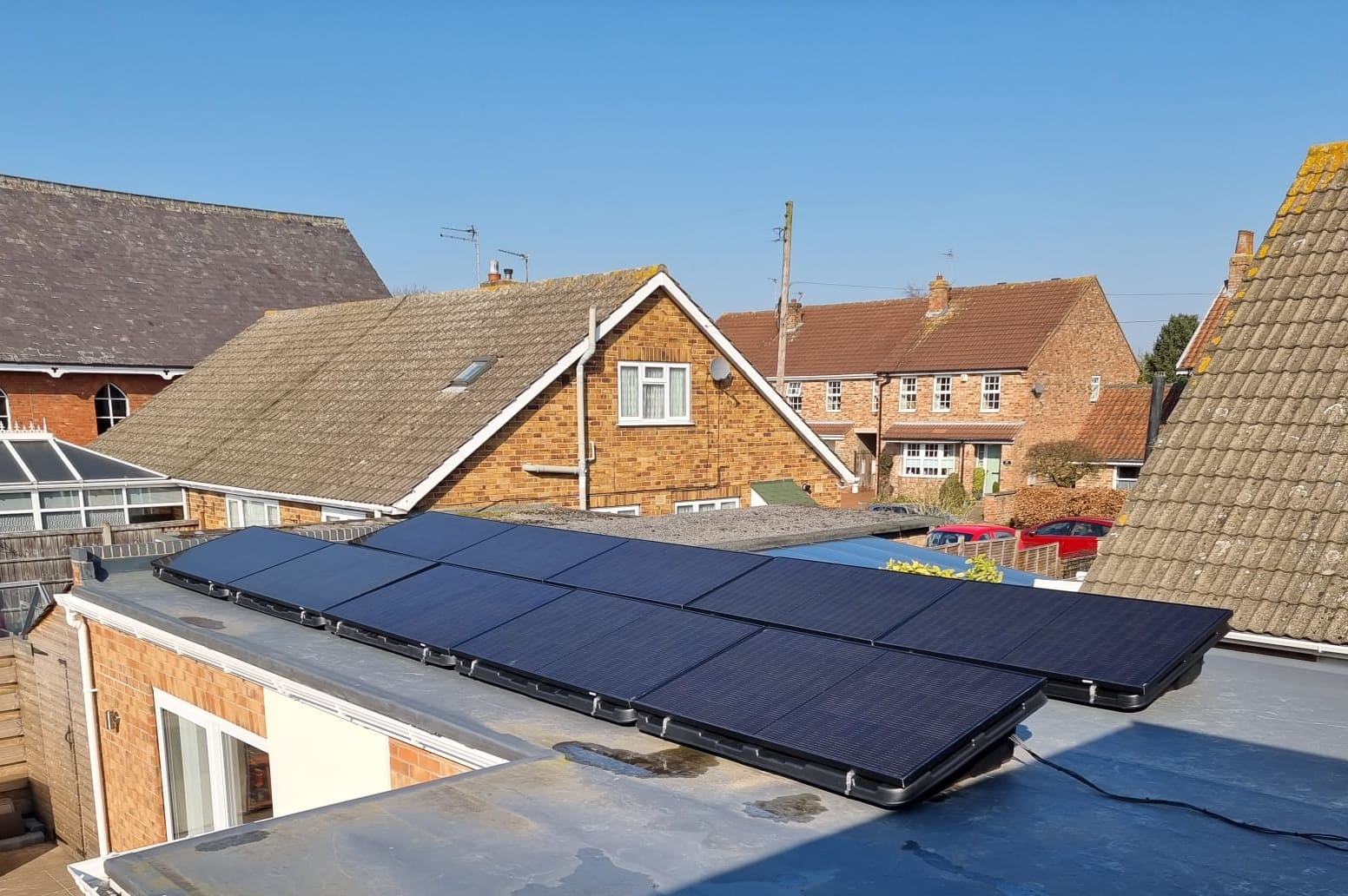 Floor/ground mount solar panels on a flat roof