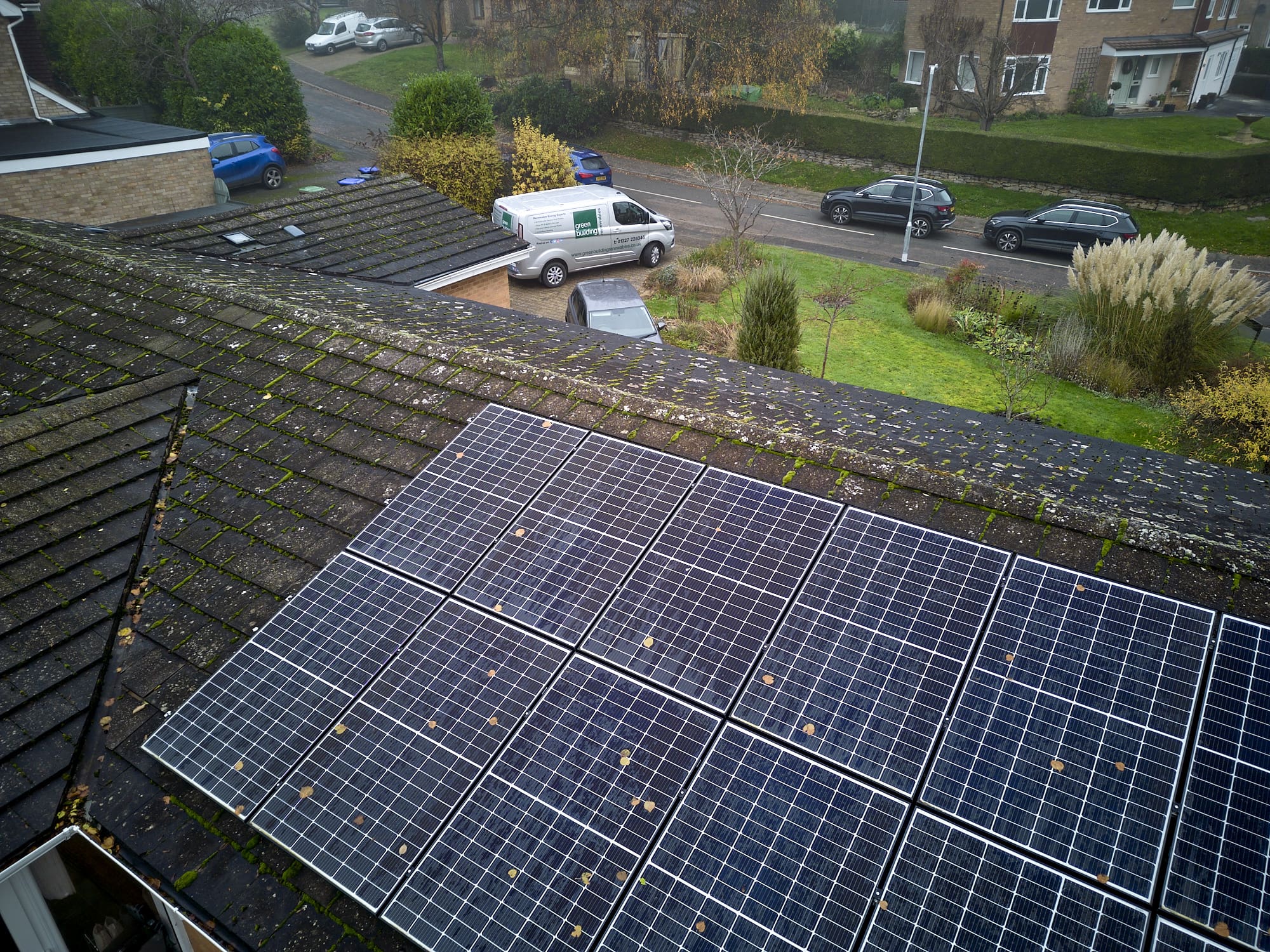 Blue solar panels on a roof.