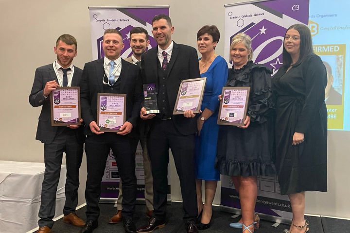 The East Midlands team display their awards